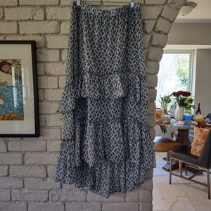 Beautiful tiered ruffle skirt. Slightly shorter in front